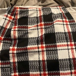 This is a black, white & red skirt. Not to short & not to long.
